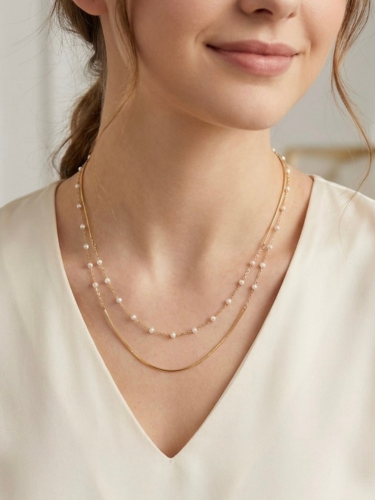 Dubbel gelaagde ketting van stainless steel met parels