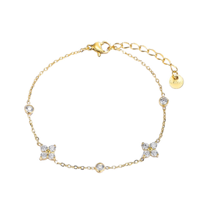 Goudkleurige armband met zirkonia bloemen en steentjes - luxe dames armband